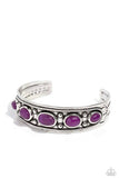 Set in oval silver frames, purple stone beads curl around the wrist atop a silver rope-textured and floral-embellished silver cuff for an artisan-inspired statement. As the stone elements in this piece are natural, some color variation is normal.  Sold as one individual bracelet.