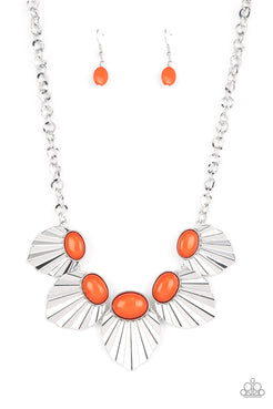 Crowned in oval Burnt Orange beads, a collection of crimped and scalloped silver frames gradually increase in size as they fearlessly fan out below the collar for a ferocious fashion. Features an adjustable clasp closure.  Sold as one individual necklace. Includes one pair of matching earrings.