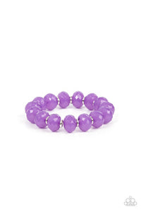 Dainty silver rings and oversized faceted opaque purple crystal-like beads alternate along a stretchy band around the wrist, creating a mystical pop of color.  Sold as one individual bracelet.