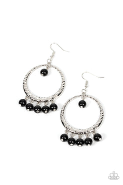 A single black bead swings from the top of a hammered silver hoop. Matching black beads dance from the bottom of the hoop, creating a bubbly fringe. Earring attaches to a standard fishhook fitting.  Sold as one pair of earrings.