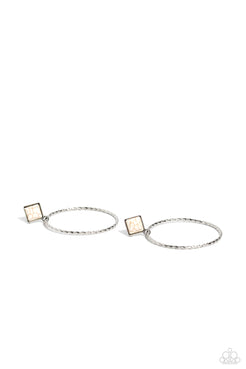 A twisted and textured silver oversized hoop, swings from the bottom of a silver-studded square frame, tilted on its point, with a refreshing white stone pressed in its center. The two rustic pieces cascade down the ear for a free-spirited finish, with eye-catching movement. Earring attaches to a standard post fitting. As the stone elements in this piece are natural, some color variation is normal.  Sold as one pair of post earrings.