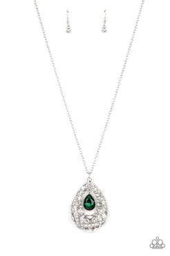 A small teardrop, crystal-like emerald green gem is pressed into a sleek, silver frame as it's suspended from a larger gem and rhinestone-dusted airy teardrop frame. The various sizes of crystal-like gems and white rhinestones haphazardly stack around the abstract-patterned teardrop frame, scattering light in every direction in a blinding finish. The stacked pendant then slides along a silver chain in a regal finish. 