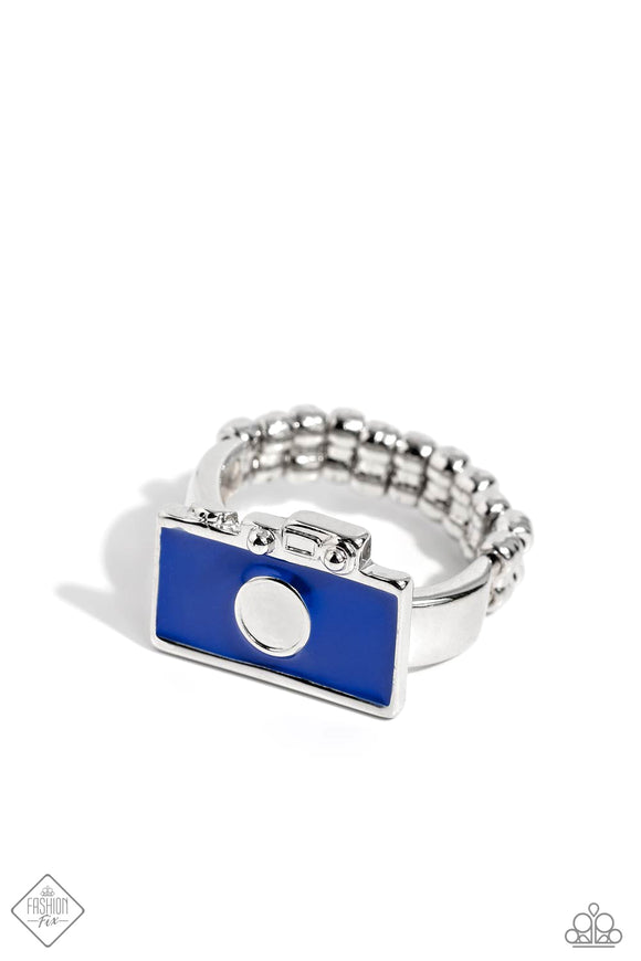 Featuring a royal blue hue, a silver-detailed camera is pressed into a dainty silver frame for a colorful tourist-inspired look. Features a dainty stretchy band for a flexible fit.  Sold as one individual ring.