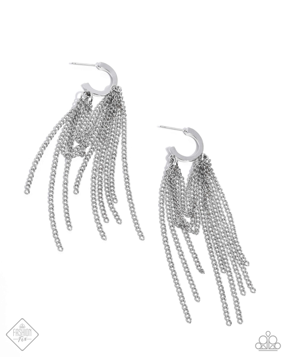 Attached in two places along a sleek dainty silver hoop, copious amounts of classic silver chains loop and taper below the ear for an endlessly edgy display. Earring attaches to a standard post fitting. Hoop measures approximately 1/2