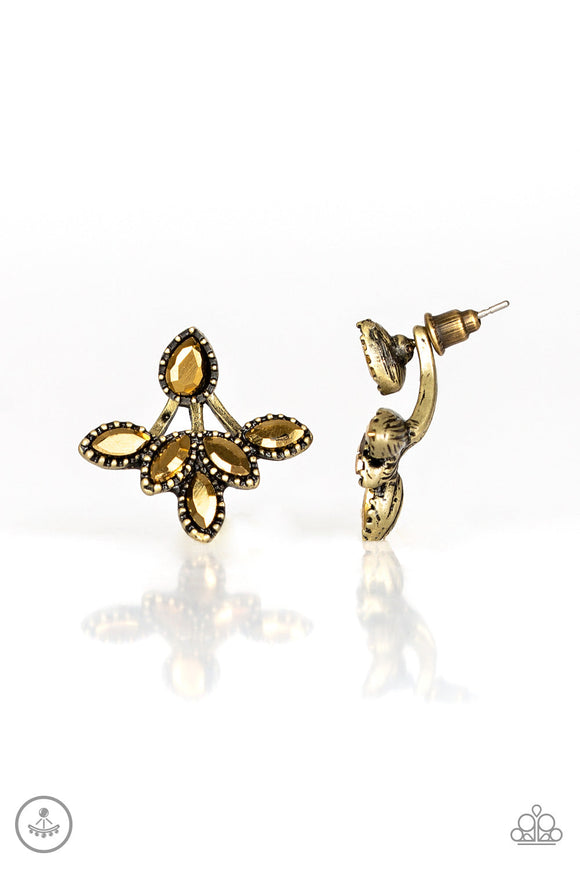 A solitaire teardrop aurum rhinestone attaches to a double-sided post, designed to fasten behind the ear. Encrusted in matching aurum rhinestones, a double-sided post peeks out beneath the ear, creating a glittery fringe. Earring attaches to a standard post fitting.  Sold as one pair of double-sided post earrings.
