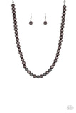 Infused with glittery hematite rhinestone encrusted beads, a strand of pearly gunmetal beads drapes below the collar in a timeless fashion. Features an adjustable clasp closure.  Sold as one individual necklace. Includes one pair of matching earrings.