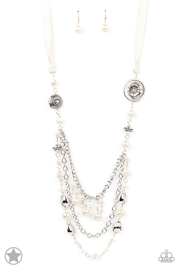 A silky ivory ribbon replaces a traditional chain to create an elegant look. Pearly ivory beads and funky silver pieces intermix with varying lengths of silver chains to give a fresh take on a Victorian-inspired piece.  Sold as one individual necklace. Includes one pair of matching earrings.