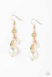 A bubbly white pearl, glassy crystal-like beads, and shimmery gold cube beads trickle along a glistening gold chain. An oversized white pearl swings from the bottom of the chain, creating a dramatic lure. Earring attaches to a standard fishhook fitting.  Sold as one pair of earrings.