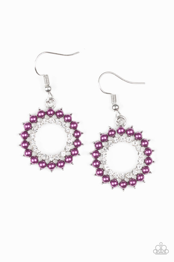 Dainty Magenta Purple pearls spin around a radiant white rhinestone center, coalescing into a refined hoop. Earring attaches to a standard fishhook fitting.  Sold as one pair of earrings.