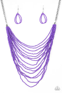 Row after row of vivacious purple seed beads cascade down the chest, creating summery layers. Features an adjustable clasp closure.  Sold as one individual necklace. Includes one pair of matching earrings.