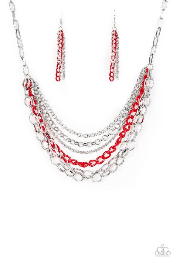 Mismatched silver chains layer below the collar for a bold industrial look. Painted in a fiery finish, a shiny red chain drapes between the shimmery silver chains for a vivacious finish. Features an adjustable clasp closure.  Sold as one individual necklace. Includes one pair of matching earrings.