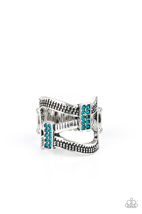 Etched and dotted in mismatched textures, three shimmery silver bars wave across the finger. Encrusted in dainty blue rhinestones, glittery frames connect the swooping bands for a refined look. Features a stretchy band for a flexible fit.  Sold as one individual ring.