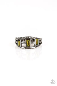 Three green emerald-cut rhinestones are encrusted along three gunmetal bands radiating with smooth surfaces and sections of glittery hematite rhinestones for an edgy fashion. Features a stretchy band for a flexible fit.  Sold as one individual ring.