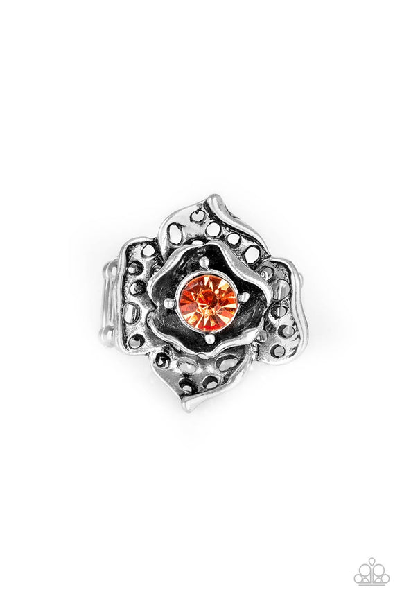 Featuring airy cut-out textures, antiqued silver petals gather around a glowing orange rhinestone center for a whimsical look. Features a stretchy band for a flexible fit.  Sold as one individual ring.