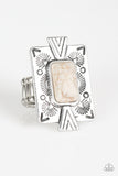 Chiseled into a tranquil rectangle, a refreshing white stone is pressed into a bold silver frame radiating with tribal inspired patterns for a seasonal look. Features a stretchy band for a flexible fit.  Sold as one individual ring