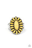 Sunny yellow stones are pressed into a studded silver frame, coalescing into a whimsical floral centerpiece atop the finger. Features a stretchy band for a flexible fit.  Sold as one individual ring.