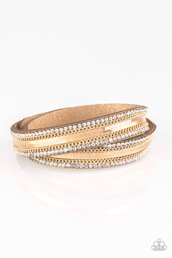 Rows of classic gold chain, flat gold chain, and dainty white rhinestones are encrusted along a suede band dusted in golden sparkles for a sassy look. The elongated band allows for a trendy double wrap design. Features an adjustable snap closure.  Sold as one individual bracelet.