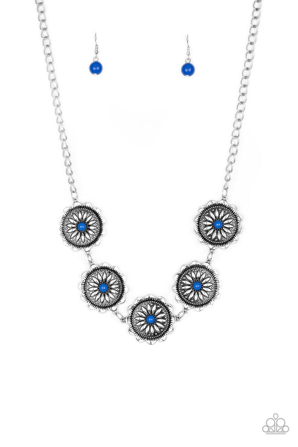 Infused with bright blue beaded centers, ornate floral stamped frames link below the collar for a colorfully, seasonal look. Features an adjustable clasp closure.  Sold as one individual necklace. Includes one pair of matching earrings.