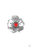 A bright red bead is pressed into the center of a blooming silver flower radiating with antiqued details for a whimsical look. Features a stretchy band for a flexible fit.  Sold as one individual ring.