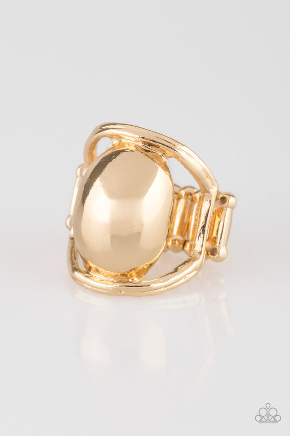 Glistening gold frames curl around a beveled gold disc, creating an edgy frame. Features a stretchy band for a flexible fit.  Sold as one individual ring.