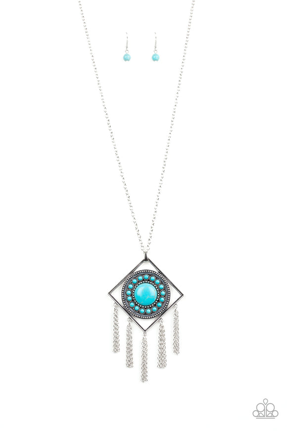 Radiating with studded details and refreshing turquoise stones, a round frame is nestled inside of an airy silver square for a tribal-inspired look. Attached to a lengthened silver chain, the colorful stone pendant gives way to rows of silver chain fringe for a statement-making finish. Features an adjustable clasp closure.  Sold as one individual necklace. Includes one pair of matching earrings.