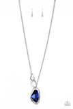 A faceted blue gem is nestled inside of a shimmery silver frame encrusted in dainty white rhinestones. The glittery pendant asymmetrically links with abstract silver frames at the bottom of a lengthened silver rounded snake chain for a modern look. Features an adjustable clasp closure.  Sold as one individual necklace. Includes one pair of matching earrings.