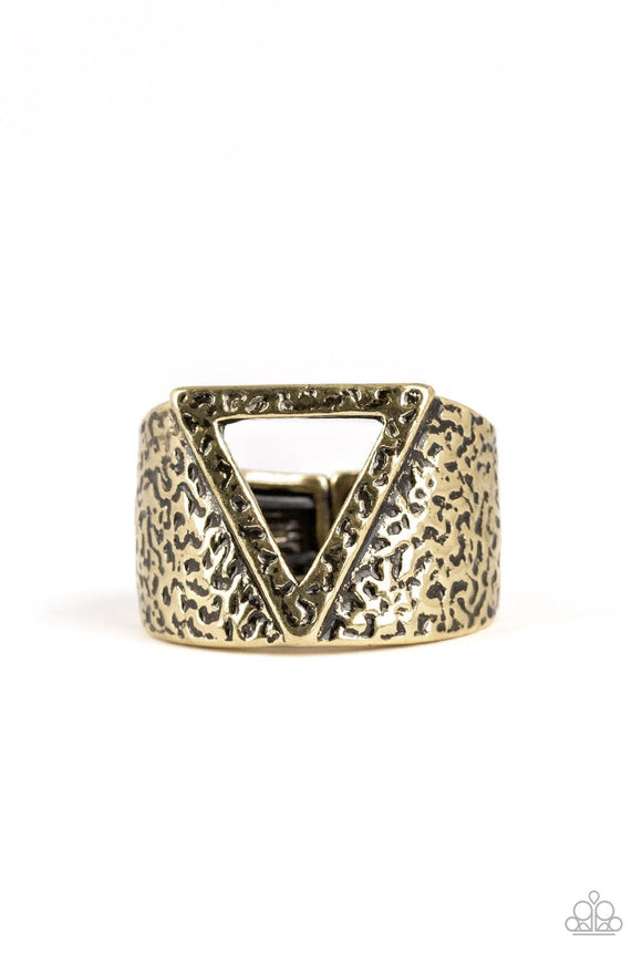 An airy triangular frame is pressed into the center of a hammered brass band for an edgy look. Features a stretchy band for a flexible fit.  Sold as one individual ring.