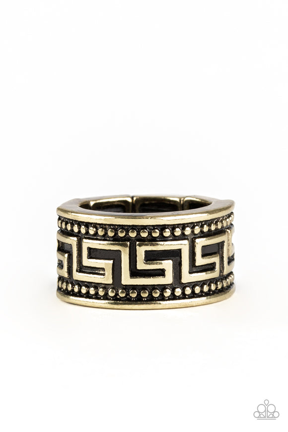 A thick brass band is studded and embossed in a tribal-inspired pattern for an edgy look. Features a stretchy band for a flexible fit.  Sold as one individual ring.