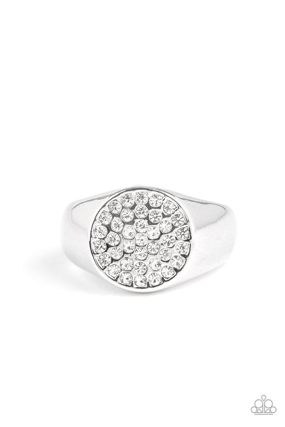 Glassy white rhinestones are encrusted atop a flattened circular frame for a statement look. Features a stretchy band for a flexible fit.  Sold as one individual ring.