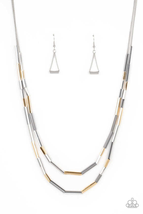 A collection of silver, gold, and gunmetal square rods slide along two dainty silver chains below the collar, creating edgy metallic layers. Features an adjustable clasp closure.  Sold as one individual necklace. Includes one pair of matching earrings.