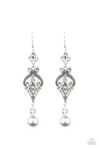 An oversized silver pearl dangles from the bottom of a flowery silver frame dotted in sections of glassy white rhinestones for an elegant look. Earring attaches to a standard fishhook fitting.  Sold as one pair of earrings.