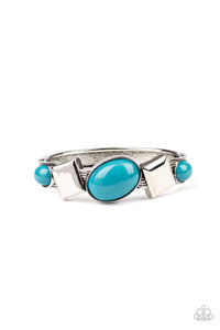 Refreshing Mosaic Blue oval beads and antiqued silver square frames are pressed into the textured front of a cuff-like bangle, creating a colorful pop of color around the wrist. Features a hinged closure.  Sold as one individual bracelet.