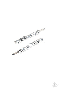 Featuring flashy faceted surfaces, glistening hematite beads dot the tops of two silver bobby pins, creating a sparkling duo.  Sold as one pair of decorative bobby pins.