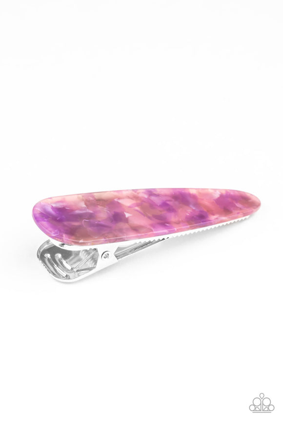 Speckled in iridescent accents, a thick acrylic frame clips back the hair for a colorfully retro look. Features a standard hair clip on the back. Color may vary.  Sold as one individual hair clip.