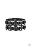 Black leather laces thread through two rows of bold silver links across the front of a thick black leather band for a gritty look. Features an adjustable snap closure.  Sold as one individual bracelet.