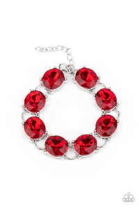 Featuring sleek silver settings, a blinding collection of oversized red rhinestones dramatically link across the wrist for a glamorous fashion. Features an adjustable clasp closure.  Sold as one individual bracelet.