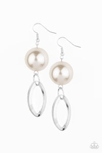 A pair of shiny silver ovals swings from the bottom of an oversized pearl, adding a timeless twist to a traditional lure design. Earring attaches to a standard fishhook fitting.  Sold as one pair of earrings.