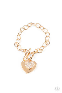 Dotted with a dainty white rhinestone, an oversized gold heart frame joins a glittery white rhinestone encrusted heart frame at the bottom of a chunky gold chain around the wrist for a charming look. Features a toggle closure.  Sold as one individual bracelet.