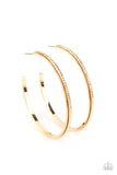 Featuring shimmery diamond-cut texture, a glistening gold bar lines the center of a beveled gold hoop, creating an edgy stacked look. Earring attaches to a standard post fitting. Hoop measures approximately 2 1/2" in diameter.  Sold as one pair of hoop earrings.