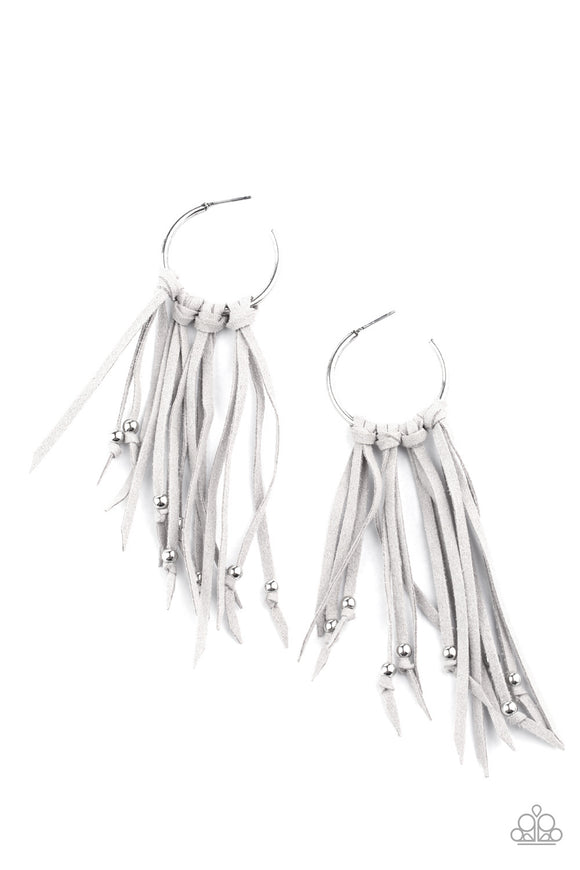 Embellished with dainty silver beads, strands of gray suede knot along the bottom of a dainty silver hoop, creating an earthy fringe. Earring attaches to a standard post fitting. Hoop measures approximately 1