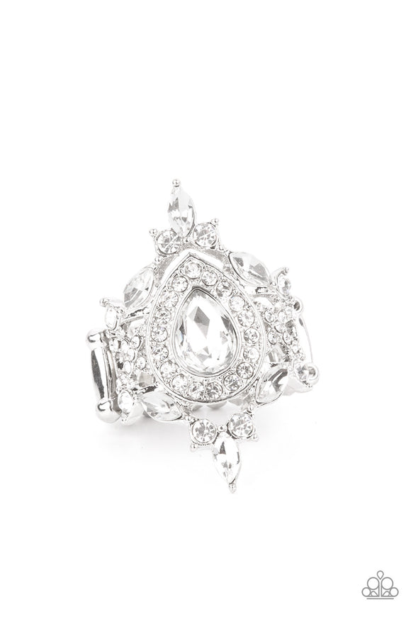 Featuring classic round and regal marquise cuts, dainty white rhinestones delicately join into a stellar frame. Encrusted in glassy white rhinestones, an oversized teardrop gem sits atop the center of a sparkly backdrop for a jaw-dropping finish. Features a stretchy band for a flexible fit.  Sold as one individual ring.
