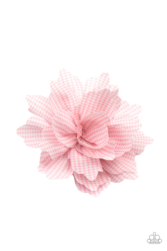 Featuring a pink and white plaid-like pattern, scalloped petals delicately gather into a colorful blossom. Features a standard hair clip on the back.  Sold as one individual hair clip.