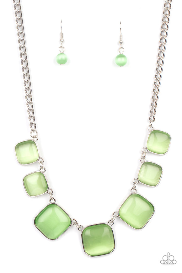 Encased in square silver fittings, a dewy collection of green cat's eye stones gradually increase in size as they link below the collar for a whimsical pop of color. Features an adjustable clasp closure.  Sold as one individual necklace. Includes one pair of matching earrings.