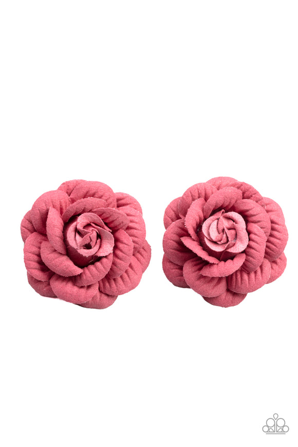 Featuring lifelike textures, papery pink petals delicately gather into a pair of charming rosebuds. Each flower features a standard hair clip on the back.  Sold as one pair of hair clips.