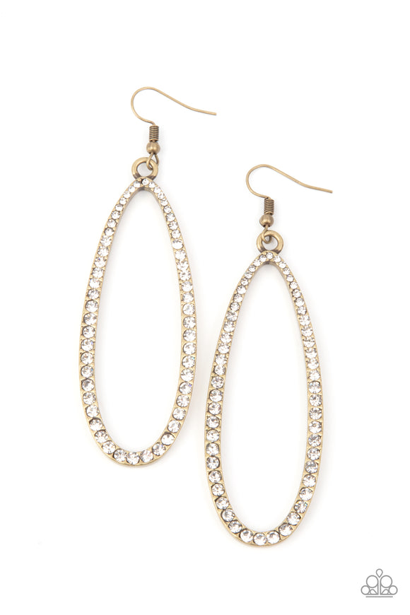 The front of a lengthened brass oval frame is encrusted in glittery white rhinestones, creating a glamorous centerpiece. Earring attaches to a standard fishhook fitting.  Sold as one pair of earrings.