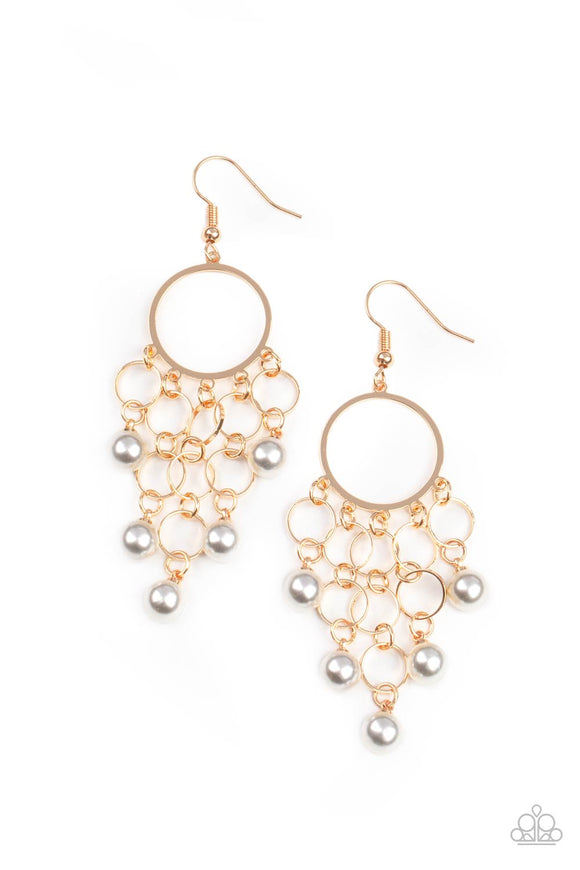Classic white pearls attach to the bottom of strands of dainty gold links, creating a bubbly tassel at the bottom of a timeless gold hoop. Earring attaches to a standard fishhook fitting.  Sold as one pair of earrings.