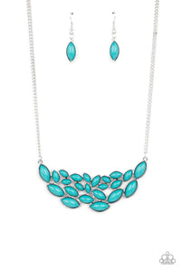 Encased in sleek silver frames, a collection of marquise shaped blue beads delicately coalesce into a leafy pendant below the collar for a whimsical pop of color. Features an adjustable clasp closure.  Sold as one individual necklace. Includes one pair of matching earrings.