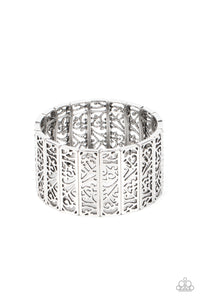 Filled with vine-like filigree centers, dainty silver rectangular frames are threaded along stretchy bands around the wrist for a seasonal inspired fashion.  Sold as one individual bracelet.