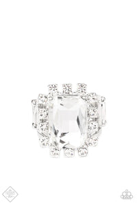 Featuring dainty silver square fittings, an explosion of glassy white rhinestones fans out from a dramatically oversized emerald cut rhinestone center, creating a stellar centerpiece atop the finger. Features a stretchy band for flexible fit.  Sold as one individual ring.