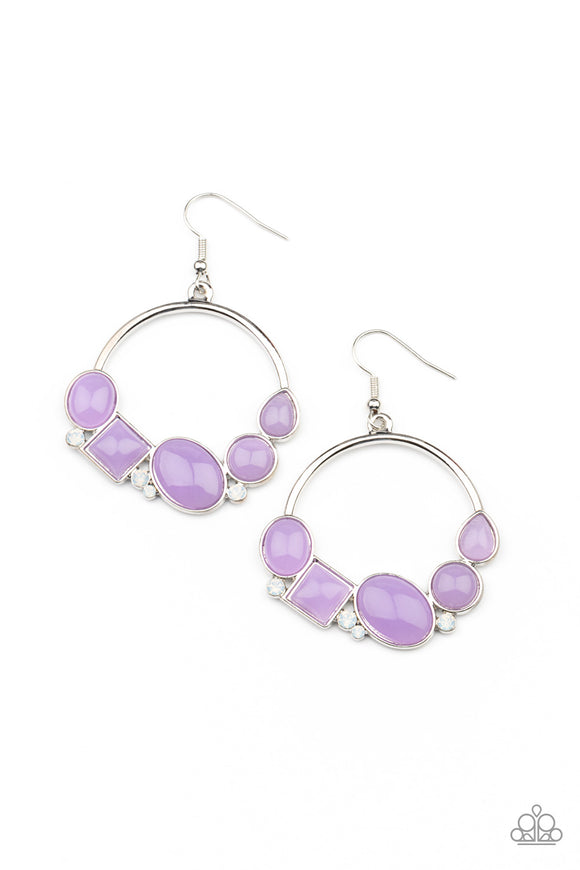 Dainty opalescent white rhinestones are sprinkled between dewy oval, square, and circular purple beads along the bottom of a silver hoop, creating a bubbly pop of color. Earring attaches to a standard fishhook fitting.  Sold as one pair of earrings.